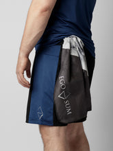 Load image into Gallery viewer, Blue shorts with zipper pockets and adjustable waist