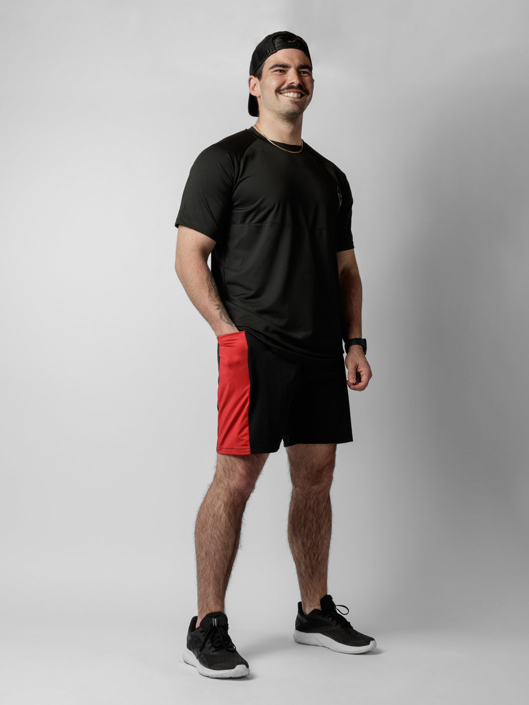 Red shorts with zipper pockets and adjustable waist