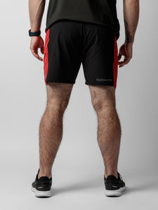Red shorts with zipper pockets and adjustable waist