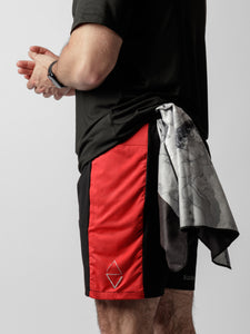 Red shorts with zipper pockets and adjustable waist